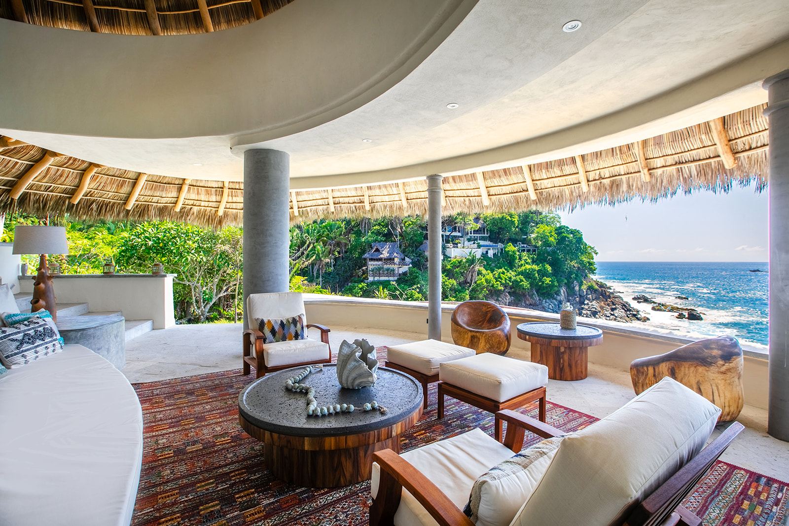 Living area under the palapa at Villa Caleta